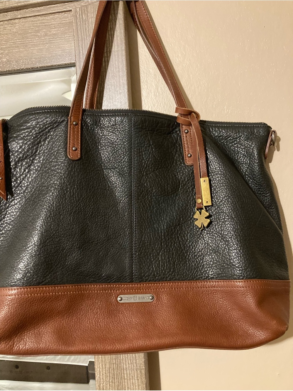 Lucky Brand Black and Brown Leather Tote with Gold Accent Charm